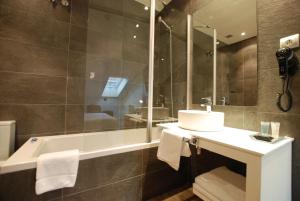 Koupelna v ubytování Hotel Andia