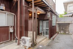 an outside view of a building with a heater at AO Niigata in Niigata