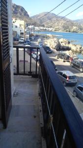 a view from a balcony of a parking lot at Spamandos Rooms in Palaiochora