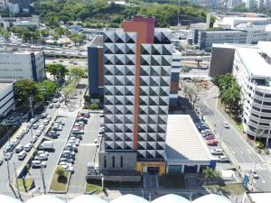an aerial view of a building in a city at Ibis Budget Salvador in Salvador