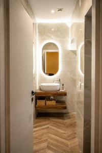 a bathroom with a sink and a mirror at Donna Teresa Amalficoast in Cetara +35 photos