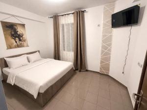 Llit o llits en una habitació de SMK Techir