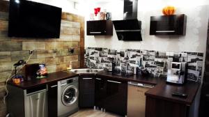 Kuchyňa alebo kuchynka v ubytovaní Art Apartments