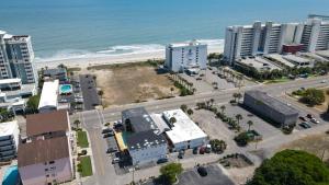 an aerial view of a city and the beach at El Dorado in Myrtle Beach