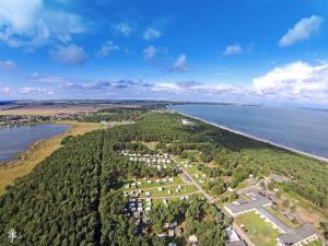 an aerial view of a beach and the ocean at FeWo im Camp Am Wasser in Juliusruh