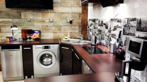 Kuchyňa alebo kuchynka v ubytovaní Art Apartments