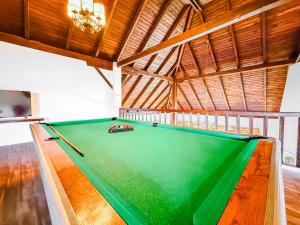 a pool table in a room with a ceiling at Hotel Sachsengang - free parking, near U1 & U2 in Groß-Enzersdorf