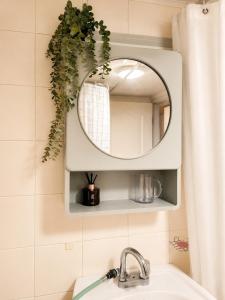 a bathroom with a mirror and a sink at 수원 화서역 편한 집 in Suwon +59 photos