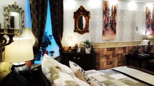 Posteľ alebo postele v izbe v ubytovaní Art Apartments