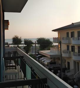 a view of the ocean from a balcony of a building at Hotel Dolores in Rimini