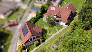 an overhead view of a house with a roof at Apartman Nina in Kvačany