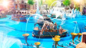 a water park with people in boats in the water at Rixos Beldibi - Adult Only - The Land of Legends Access in Beldibi