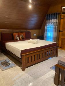 a bedroom with a large bed in a room at Jungle Eco Lodge & Safari in Sigiriya +165 photos
