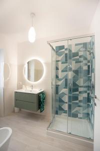 a bathroom with a glass shower and a sink at G&G Bed&Breakfast in Bonorva +48 photos