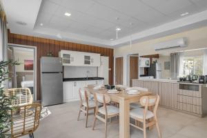 a kitchen and dining room with a table and chairs at 800 Mountains view in Fujairah +45 photos