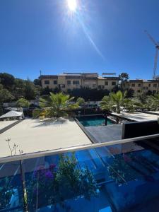 a view of the pool from the roof of a building at Hotel Ruko Boutique in Golem