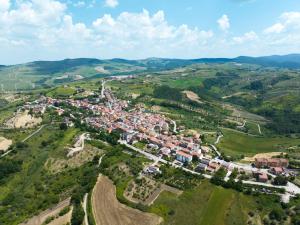an aerial view of a village in the hills at Casa Vacanza Zhurian in Ginestra