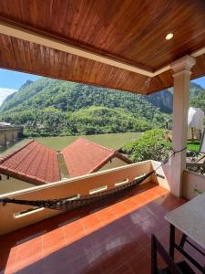 a view from the balcony of a house at Views Backpackers Hostel in Nongkhiaw