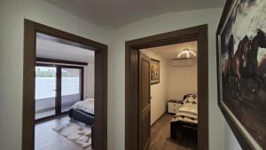 a room with a bed and a door to a bedroom at Belgrade River House in Belgrade +148 photos