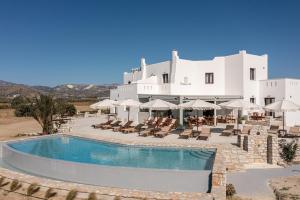 a resort with a swimming pool and a building at Naxian Air in Naxos Chora +125 photos