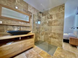 a bathroom with a sink and a shower at Camping 4 étoiles - Piscine - ccbgbac in Arques +49 photos