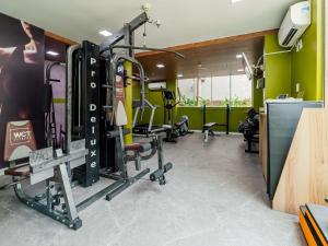 a gym with several treadmills and tread machines at ibis Styles Manaus in Manaus