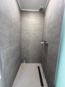 a bathroom with a shower in a room at Kalithea Palekastro in Palekastron +15 photos