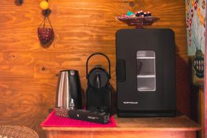 a black appliance sitting on top of a table at Roulotte du Rouard in Camiers