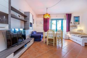 Postel nebo postele na pokoji v ubytování Apartments Villa Ana