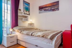 Postel nebo postele na pokoji v ubytování Apartments Villa Ana