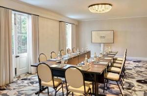a conference room with a long table and chairs at Omni Royal Orleans Hotel in New Orleans +146 photos