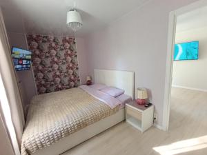 Llit o llits en una habitació de New Võidu apartment