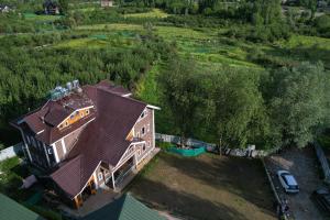 an overhead view of a large house with a roof at The Forest Castle Resort in Pahalgām
