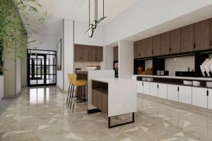 a kitchen with a island in the middle of a room at TownePlace Suites by Marriott Vaughan in Vaughan