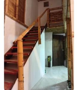 a set of stairs in a building at Guaduales Apartamento in Salento