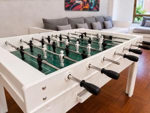 a large foosball table with a chess board at La Casa de los Inventos in Burgos