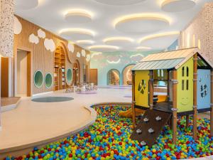 a room filled with lots of balls at Rixos Murjana - Ultra All Inclusive in King Abdullah Economic City