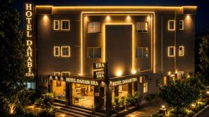 a building with a sign that reads hotel orient bar at Dahabi Airport Hotel Era in New Delhi