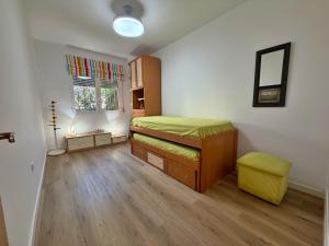 a small bedroom with a bed and a window at El Hidalgo Costa del Sol in Torre de Benagalbón +77 photos