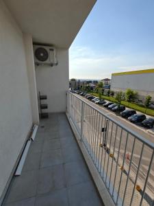 a balcony with a view of a parking lot at DfA in Tirana