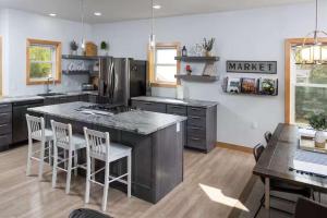 a kitchen with a large island with a counter top at Maison Rouge by Simple Life Rentals in Luxemburg +68 photos