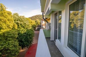 a balcony of a house with a window at V&G Apartments in Kyustendil