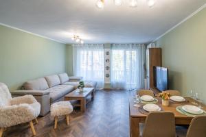 a living room with a couch and a table at V&G Apartments in Kyustendil