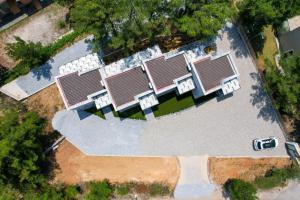 an overhead view of a group of solar panels at Pine Suites in Potos