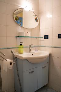 a bathroom with a sink and a mirror at B&B L'Antico Borgo in Milazzo +67 photos