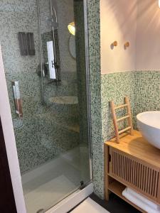 a glass shower in a bathroom with a sink at Sale34 in Marsala +63 photos