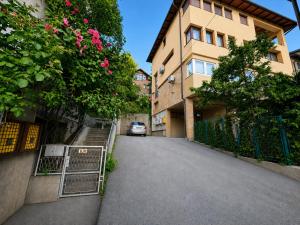 an empty street in front of a building at Old Town Bistrik - Free parking in Sarajevo