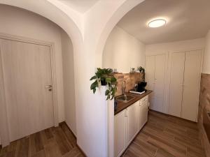 a kitchen with a sink and a counter top at Casa Ma&Emy in Roccaporena
