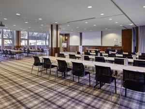 a conference room with tables and chairs in it at Mercure Hotel Severinshof Köln City in Cologne