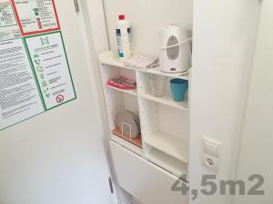 a refrigerator with its door open withagentsagentsagentsagents at Aparthotel Sanni in Bremen